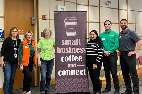 GO Technology Group team member networking with local professionals at the Arlington Heights Memorial Library Coffee & Connect event, sponsored to support small business and community technology awareness