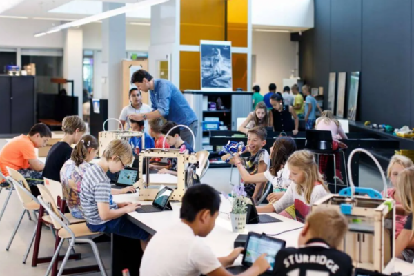 Libraries 4 Students using classroom technology during a collaborative learning activity