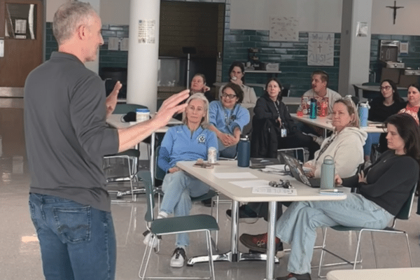 AI cybersecurity presentation for school leaders in Chicago classroom setting