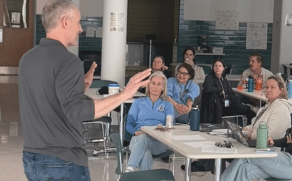 AI cybersecurity presentation for school leaders in Chicago classroom setting