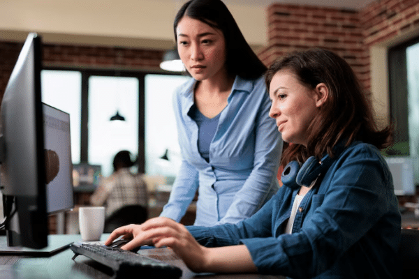 Sales team using cloud tools Team collaborating on cloud applications supporting cloud innovation and modern business operations.
