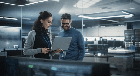 Cybersecurity professionals reviewing network security controls required for cyber insurance coverage