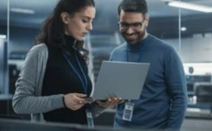 IT professionals reviewing network infrastructure and cybersecurity systems for small business IT management and cloud performance