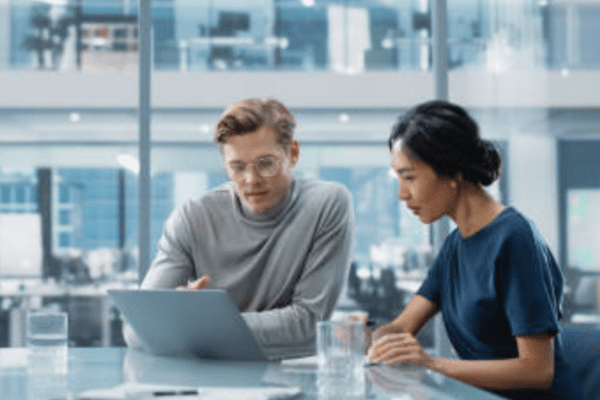 IT professionals collaborating to diagnose and resolve business technology issues through network troubleshooting IT support