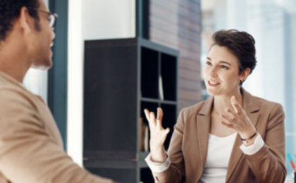IT consultant advising a small business owner on proactive IT solutions