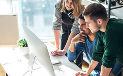 Business professionals reviewing Technology KPIs to strengthen cybersecurity, proactive IT management, and long-term business success